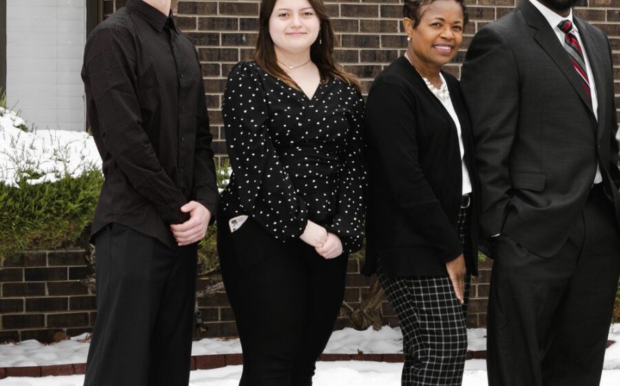 Dr. Jerome Adams with members of the Horizon Physical Therapy team outside the Flint clinic